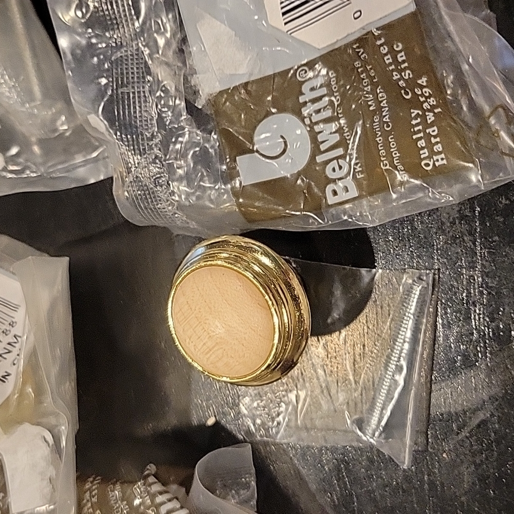 Cabinet knobs,20,New in packages,Blonde wood,goldtone metal.Stunning!